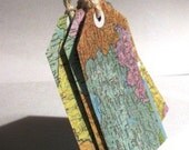 12 Luggage tags from upcycled map book